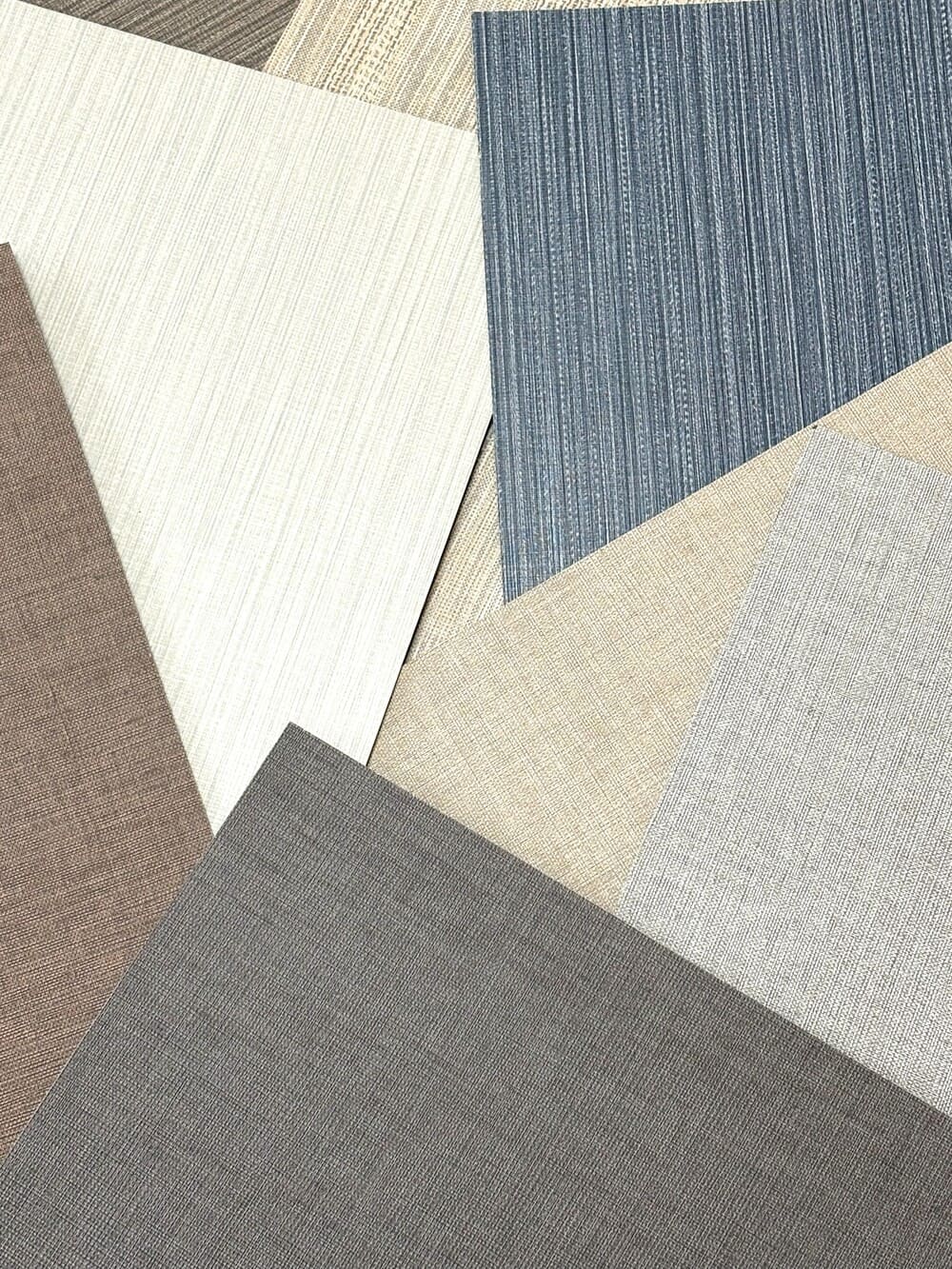 Cross-section of an HPL sheet showing the layered structure including the polyester nonwoven backing