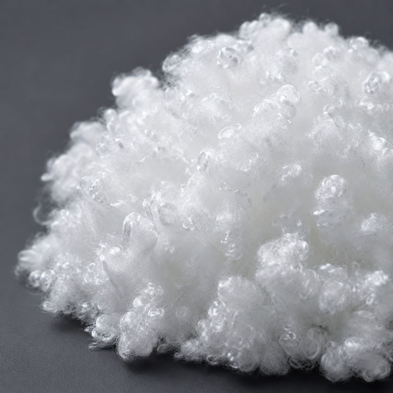 Polyester staple fiber (PSF) — the raw material for nonwoven fabrics used in HPL manufacturing